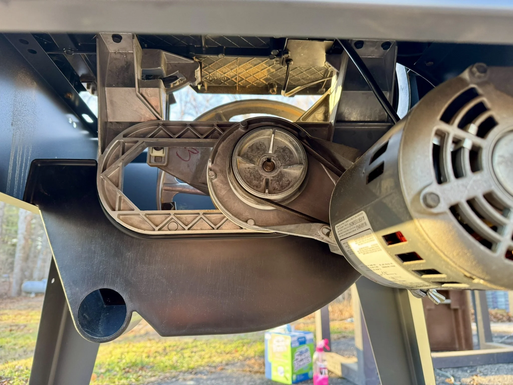 Vintage Craftsman tilt band saw drive belt and pulley system during a precision tune-up at Brown County Tool Works.