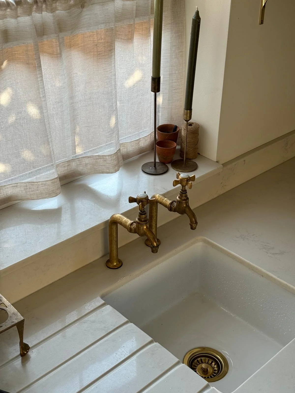 Sheer Natural Linen Cafe Curtain above a kitchen sink