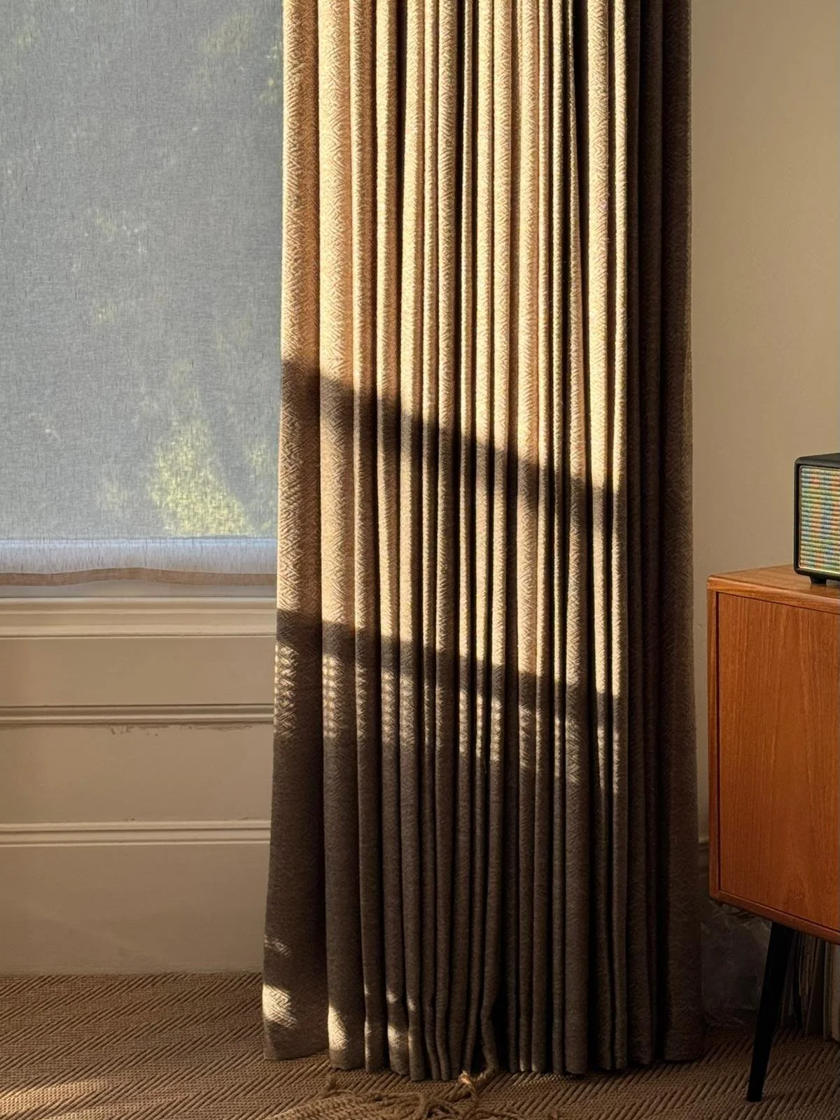 Full length curtains in a bronze textured fabric