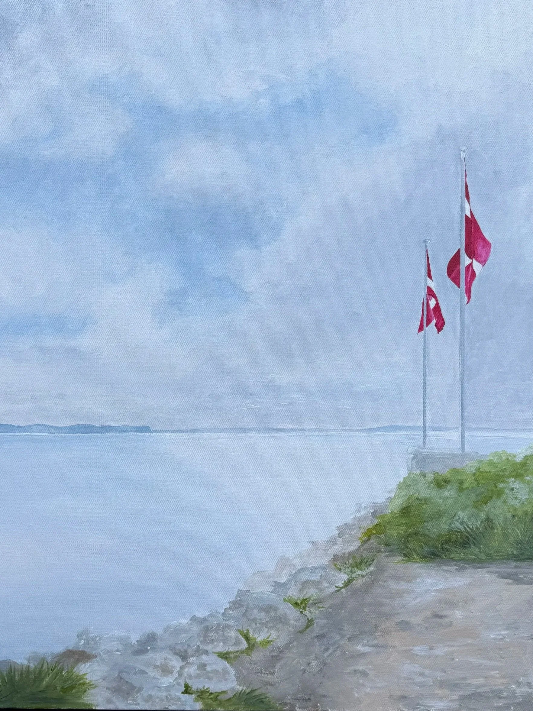 Painting of a waterfront scene with two flags on poles, one with a cross and the other with a swirl, on a rocky and grassy ledge overlooking a calm body of water, sky cloudy and distant land visible.