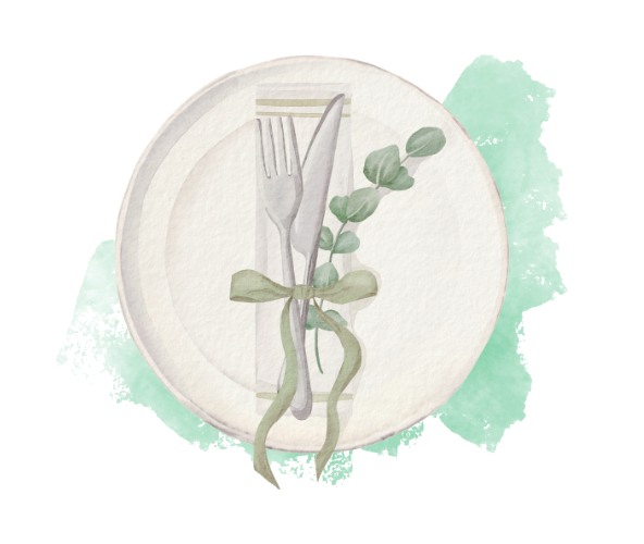 A white plate with a fork and knife tied with a green ribbon and a small branch of eucalyptus leaves on top.