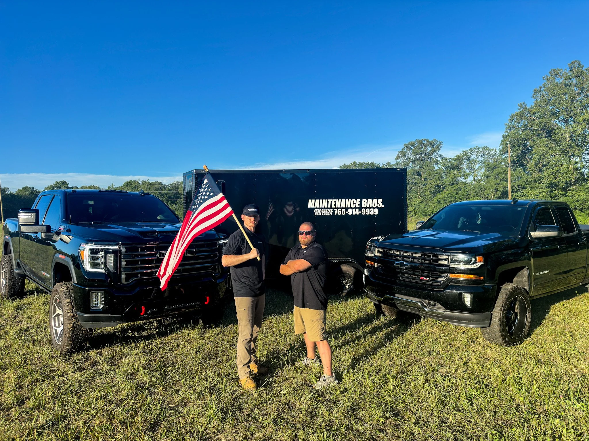 Maintenance Bros lawn care and landscaping team in Richmond Indiana with trucks and equipment