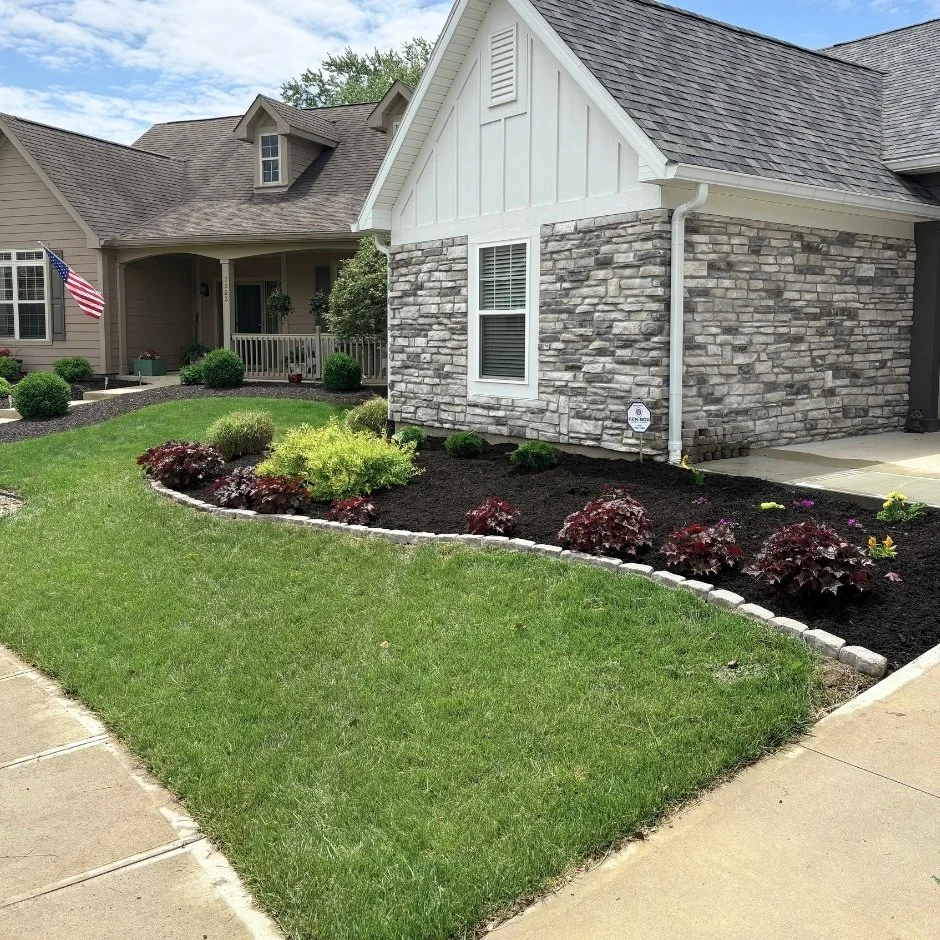 Front yard landscaping and mulch bed installation in Richmond Indiana by Maintenance Bros landscaping team