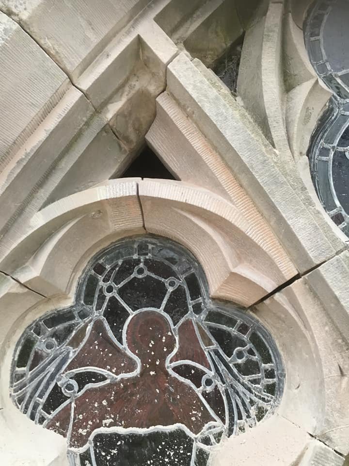 Restored gothic stone window surround 
