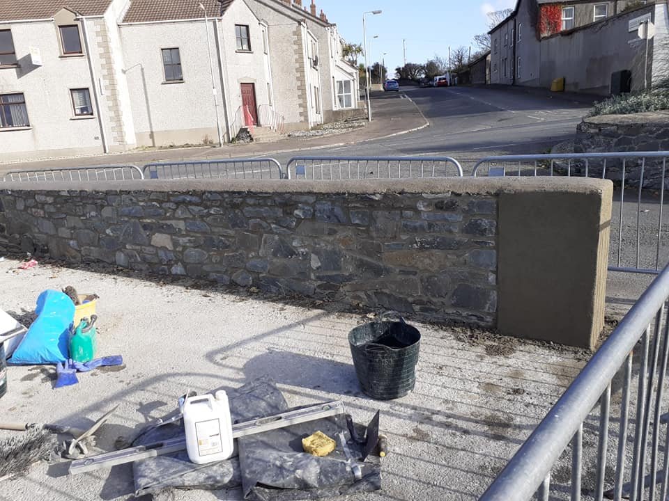 Traditional stone wall repair