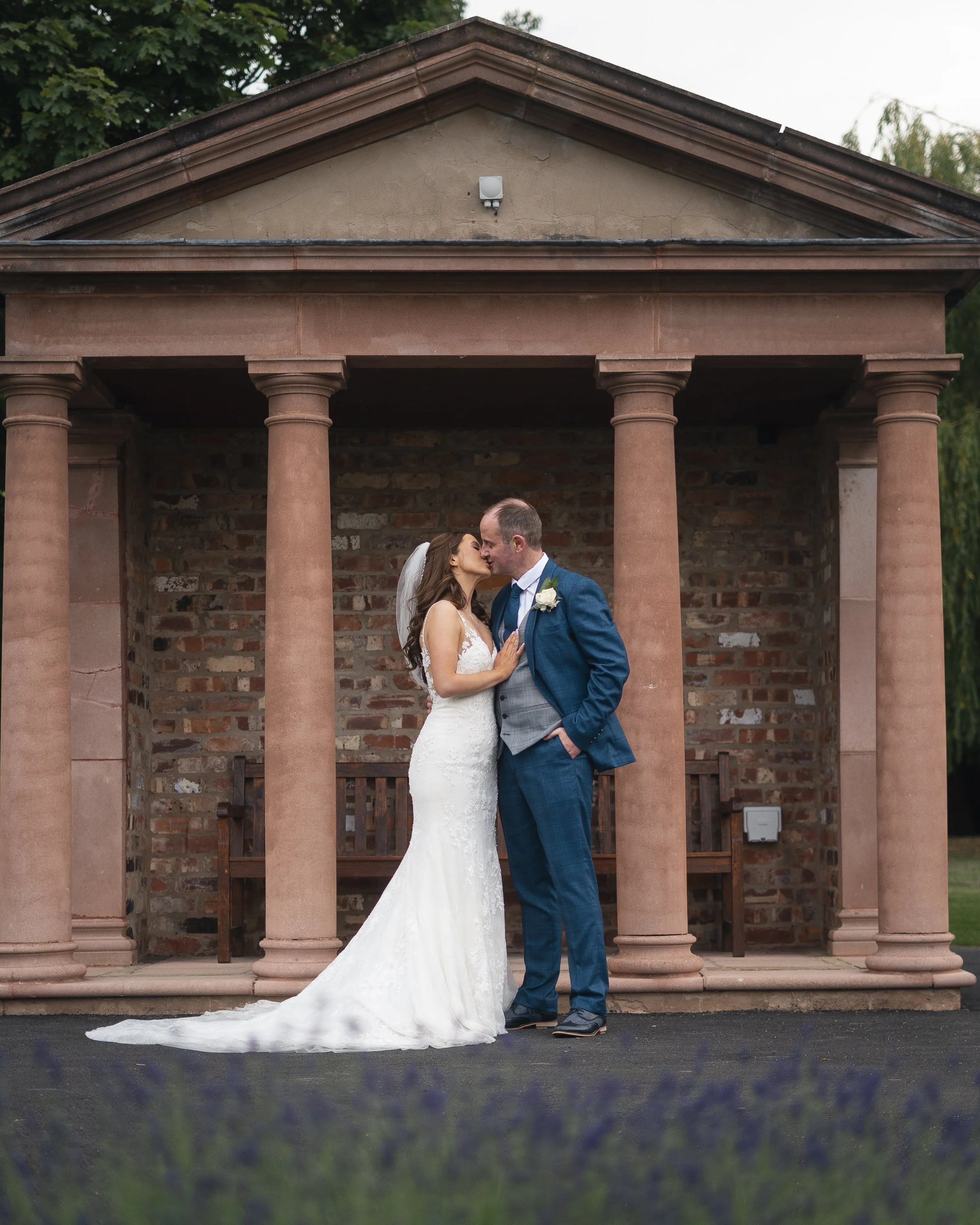 carden park hotel wedding photography cheshire wedding photographers couple outside in grounds