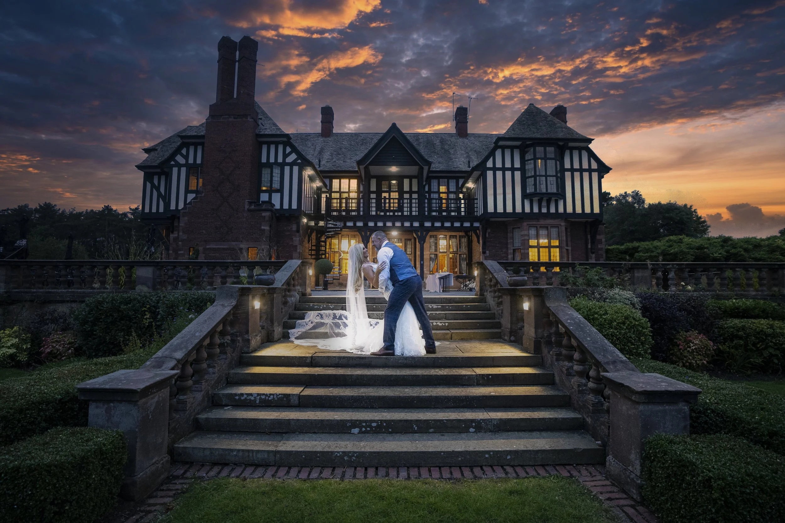 Inglewood Manor House wedding couple in gardens in summer sunset couple stairs