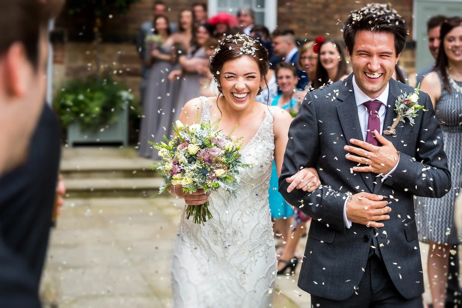 The West Mill, Derby wedding photography, couple in confetti 