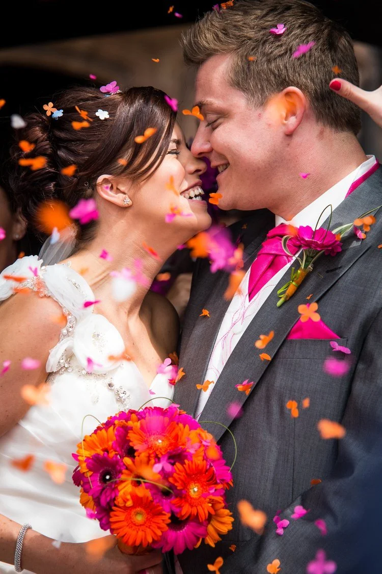 wirral wedding photography in church wedding couple in confetto