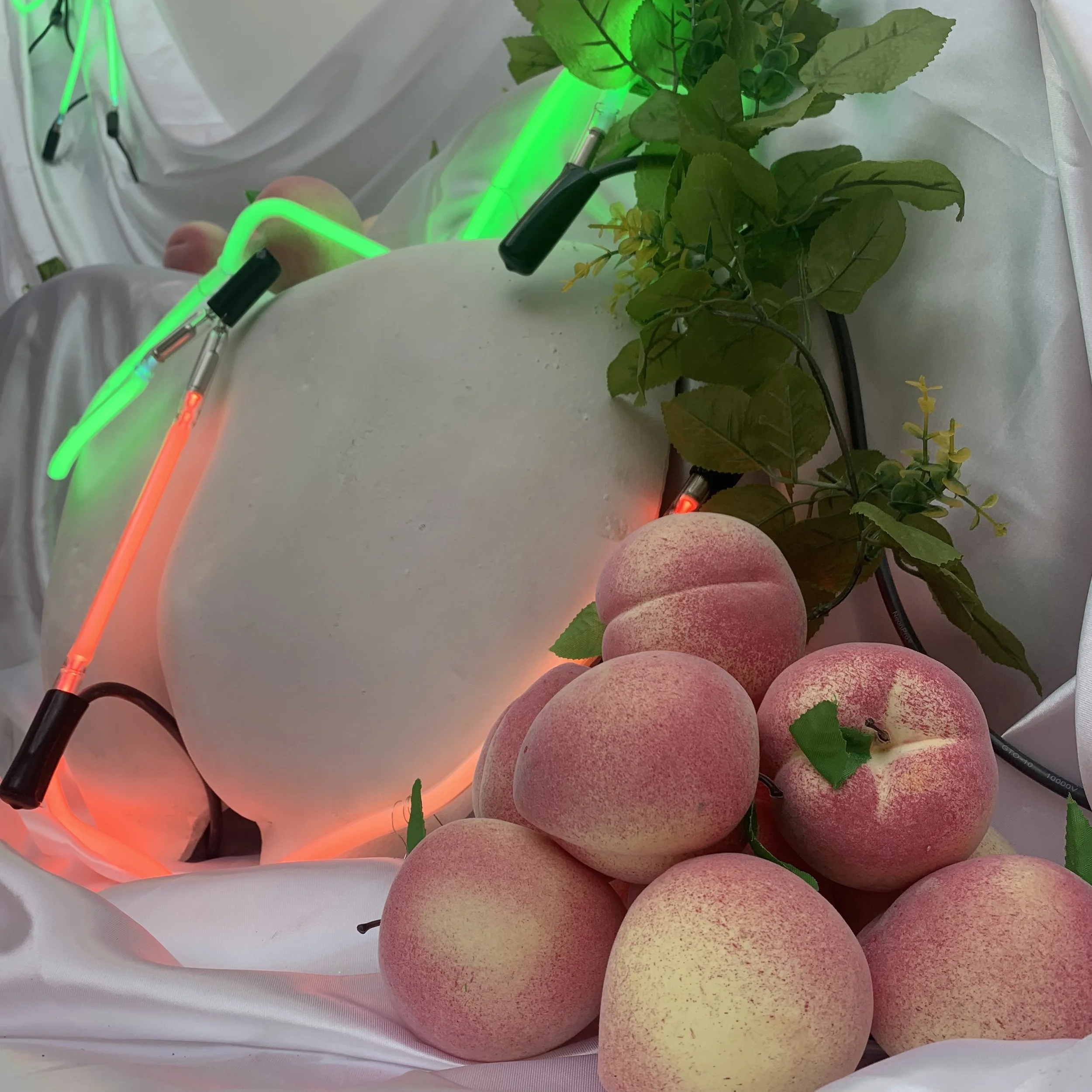 A love piece (plaster, neon, mixed media)