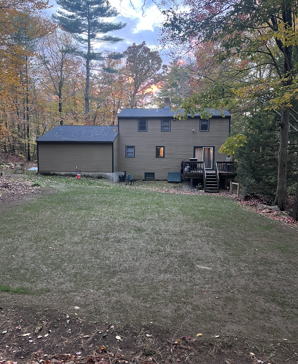 Backyard picture in October. Although the French Drain wasn't tested too much this summer (hot and dry!!!), we were able to do some late seeding in the Fall to renovate the backyard. Excited for the grass to "explode" come Spring!