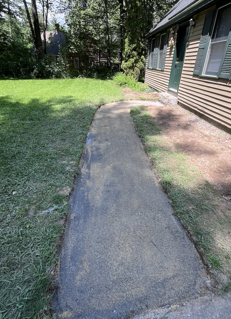 Next, we put the solid layer of paver sand on top of the crushed stone base.