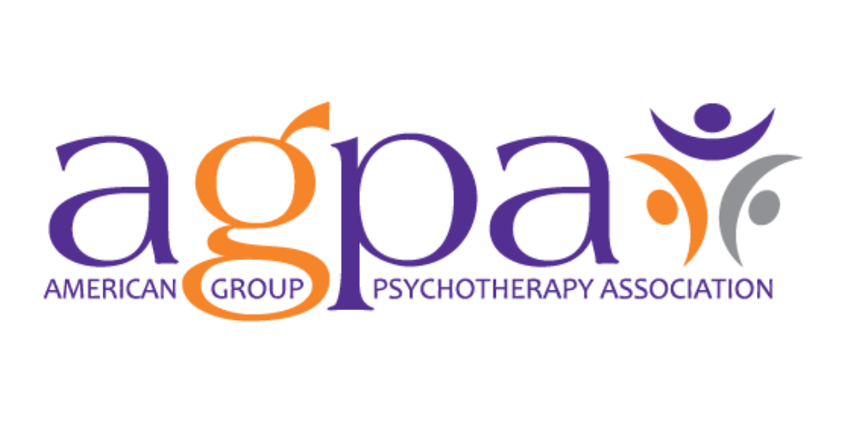 Logo of the American Group of the Psychotherapy Association with purple, orange, and gray colors, featuring stylized text and a person figure with arms raised.
