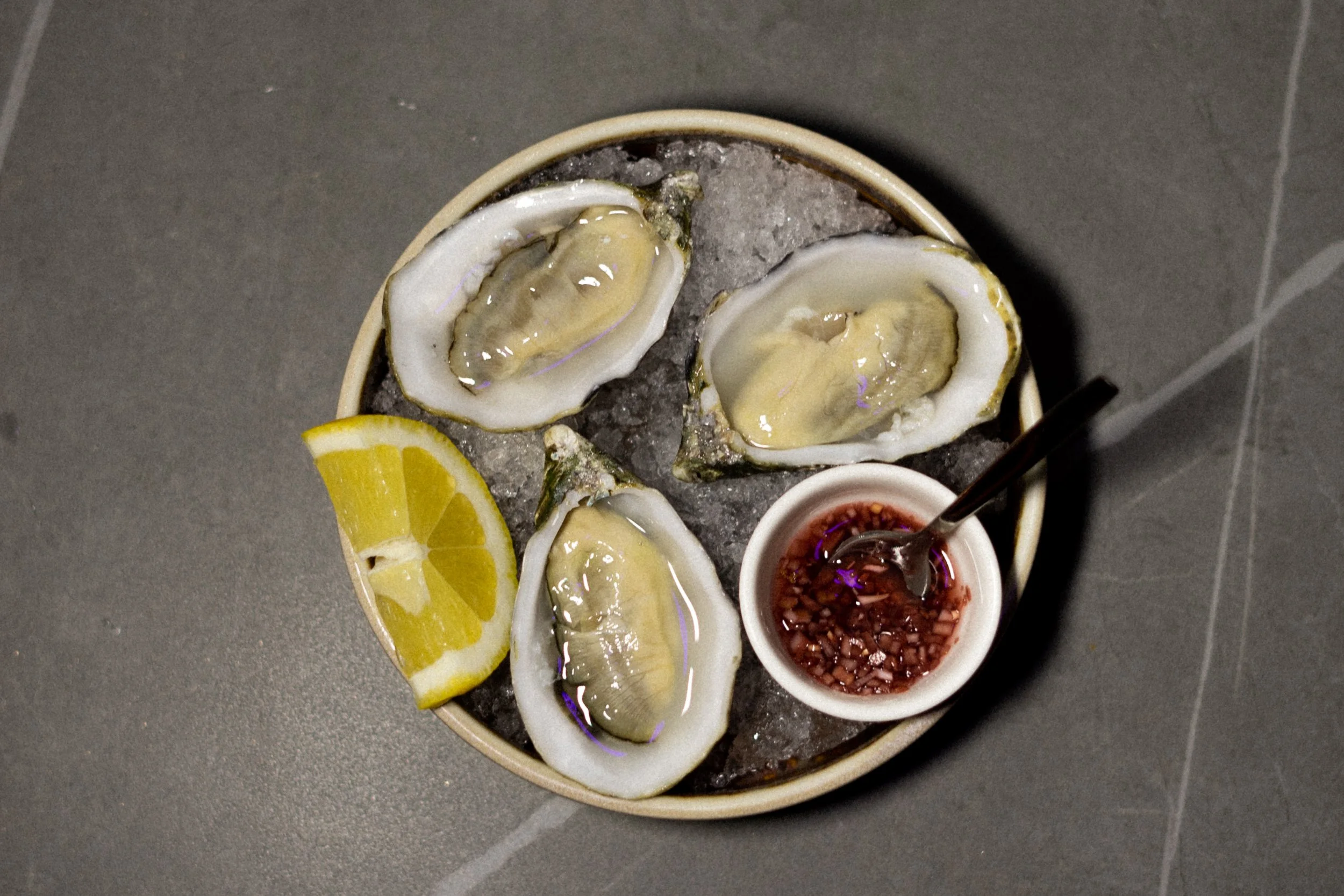 Noitada Isn't Just a Bar — You Can Also Have Dinner and Oysters Here