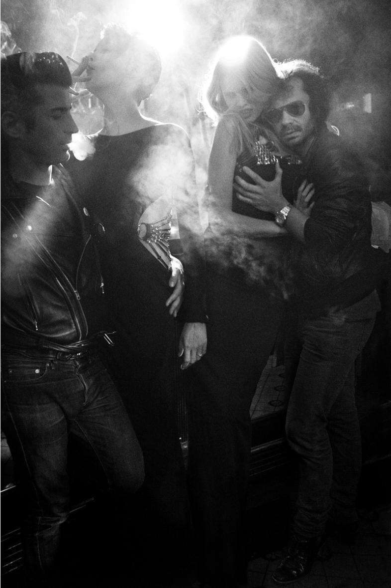  André Saraiva, graffiti artist and club owner, with models Trish Goff and Lara Stone and  Purple  magazine co-founder Olivier Zahm, on October 4, at 10 p.m., at Le Montana. 