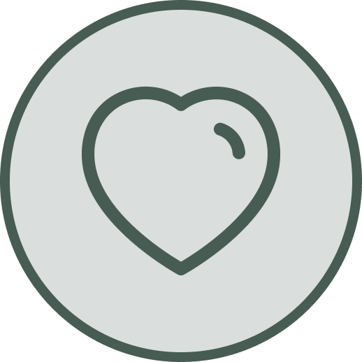 Green circular object with a faint heart shape in the center
