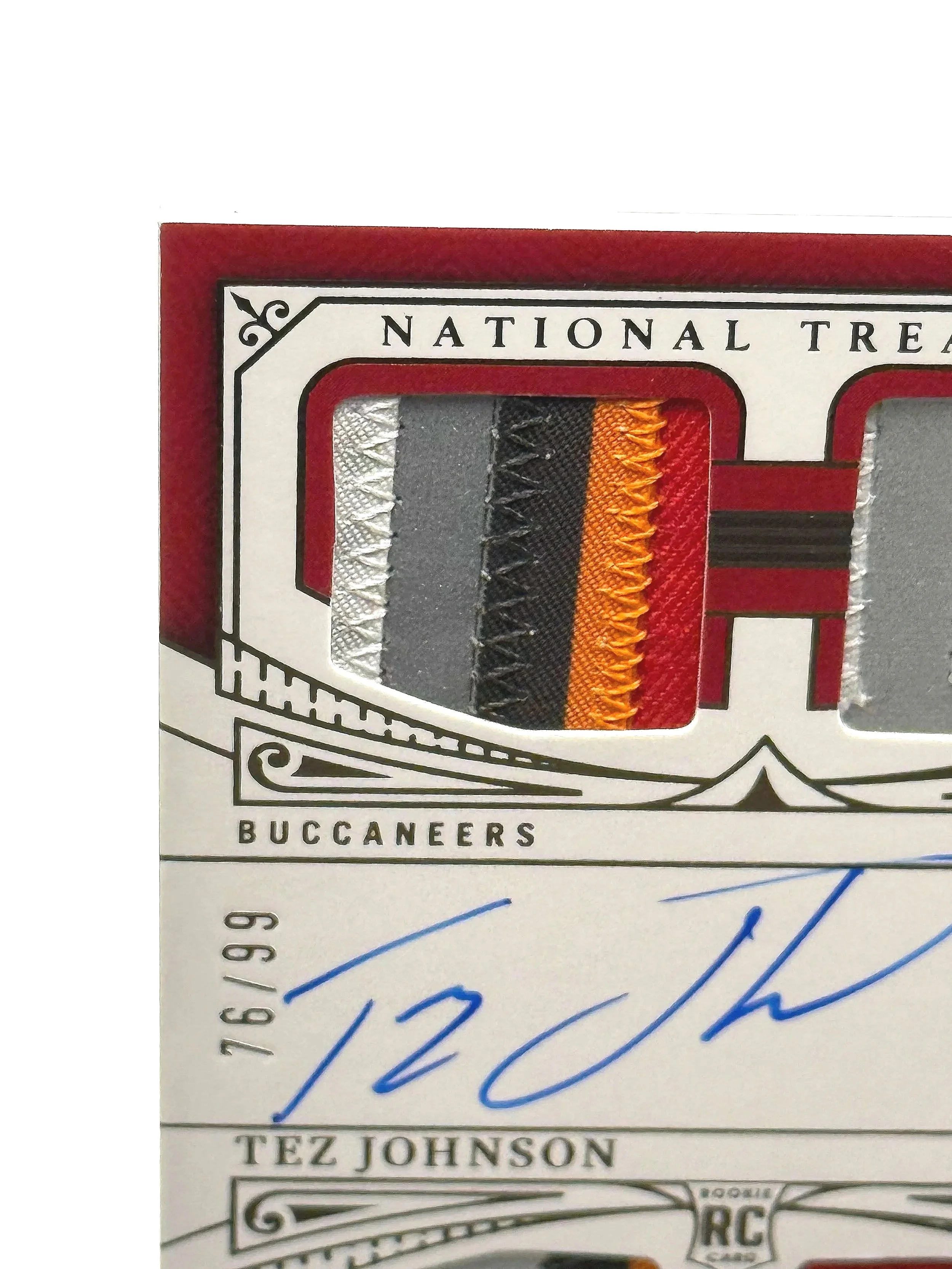 2025 Panini National Treasures – Tez Johnson Rookie Materials Auto Quad Patch #RMAQ-TJN football card top left corner