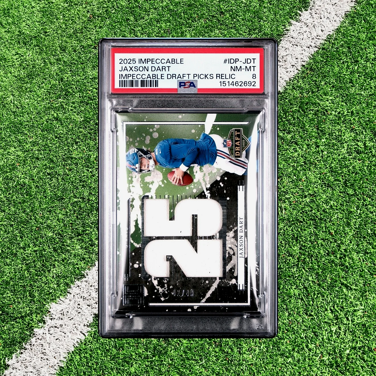 2025 Impeccable Jaxson Dart Draft Picks Relic /49 #IDP-JDT PSA8 - Giants football card slab front studio
