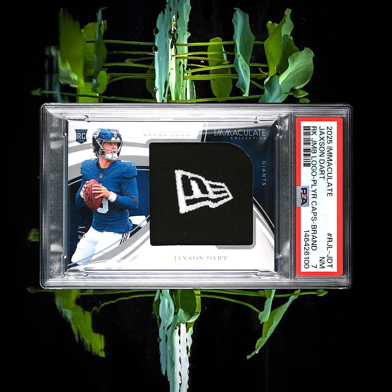 2025 Immaculate Jaxson Dart Rookie Jumbo Logo Player Caps /3 #RJL-JDT PSA7 Football Card Slab Front Studio Horizontal