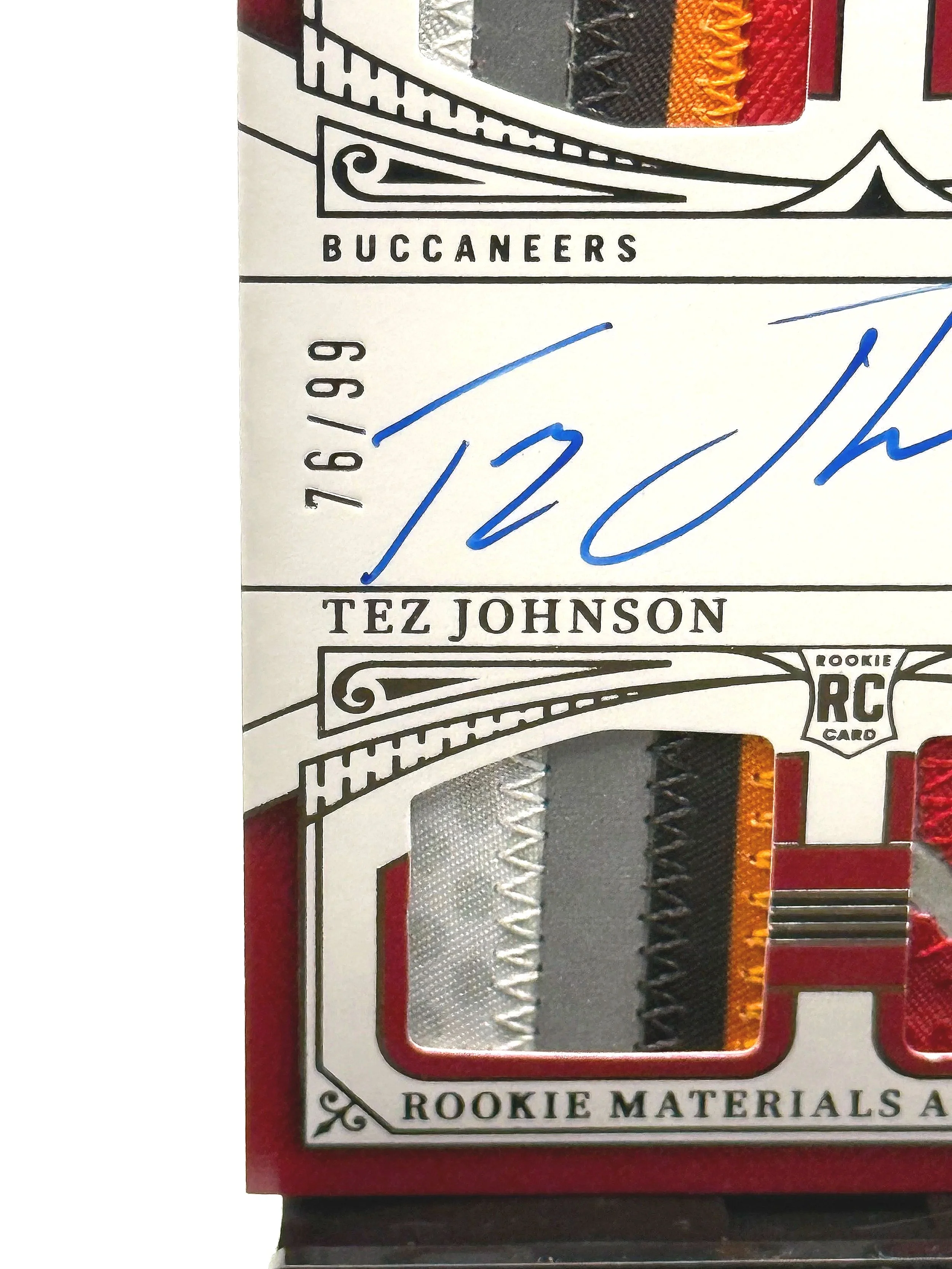 2025 Panini National Treasures – Tez Johnson Rookie Materials Auto Quad Patch #RMAQ-TJN football card bottom left corner