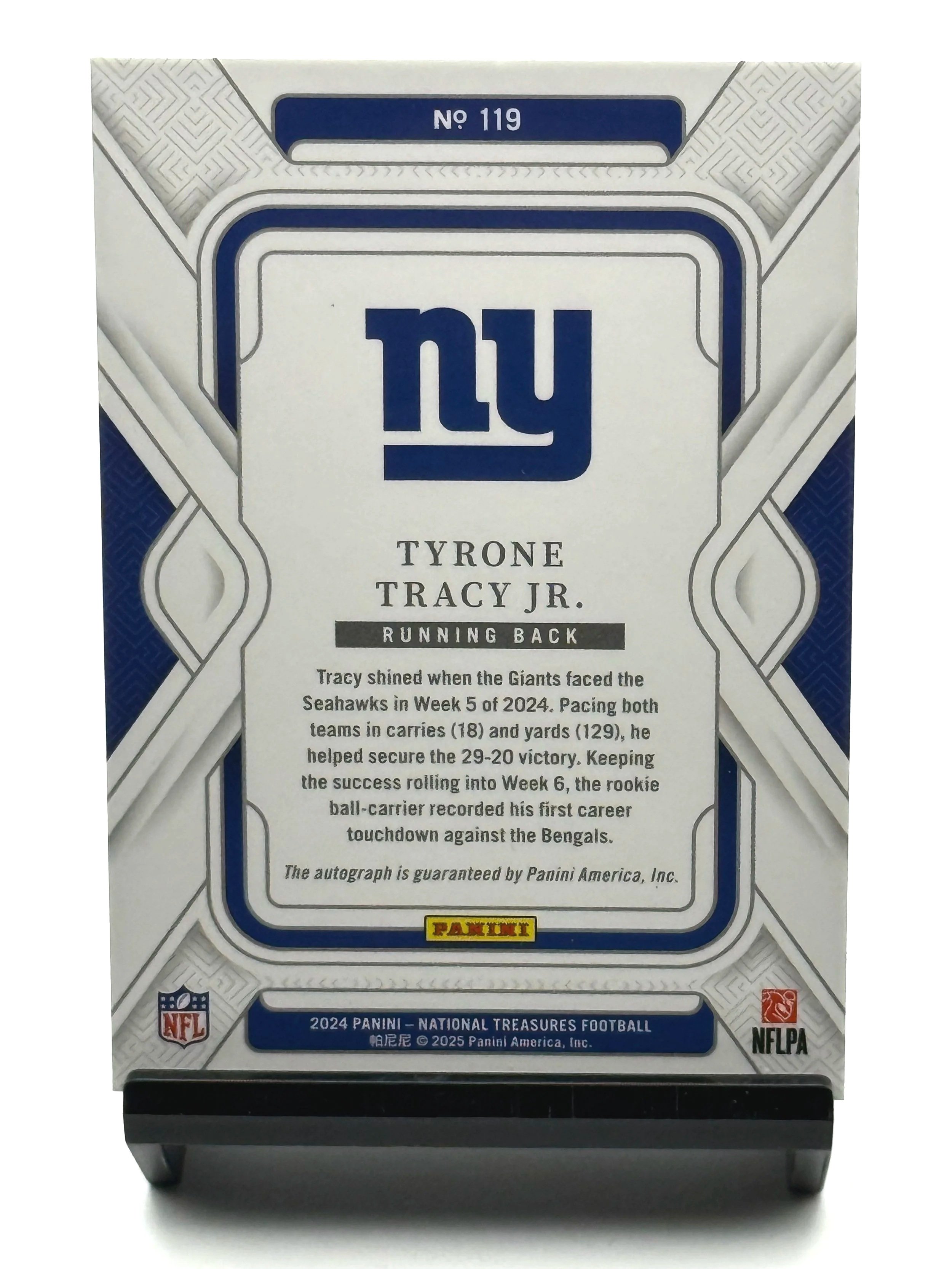 Back of 2024 Panini National Treasures Tyrone Tracy Jr Rookie Auto Purple /49 #119 card showing card details and serial numbering