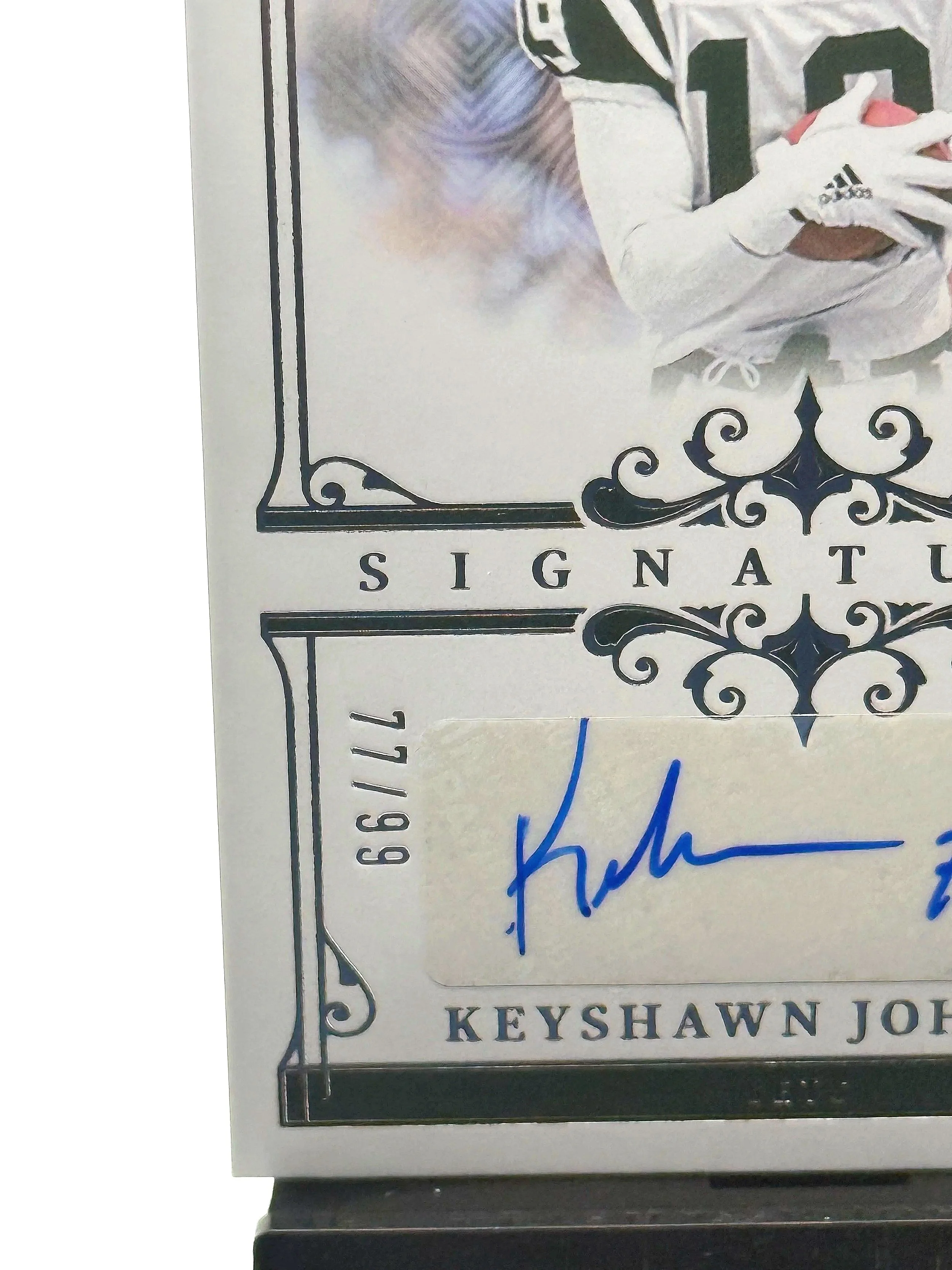 2025 National Treasures Keyshawn Johnson Signatures NT #SIG-KJN - Jets football card bottom left corner