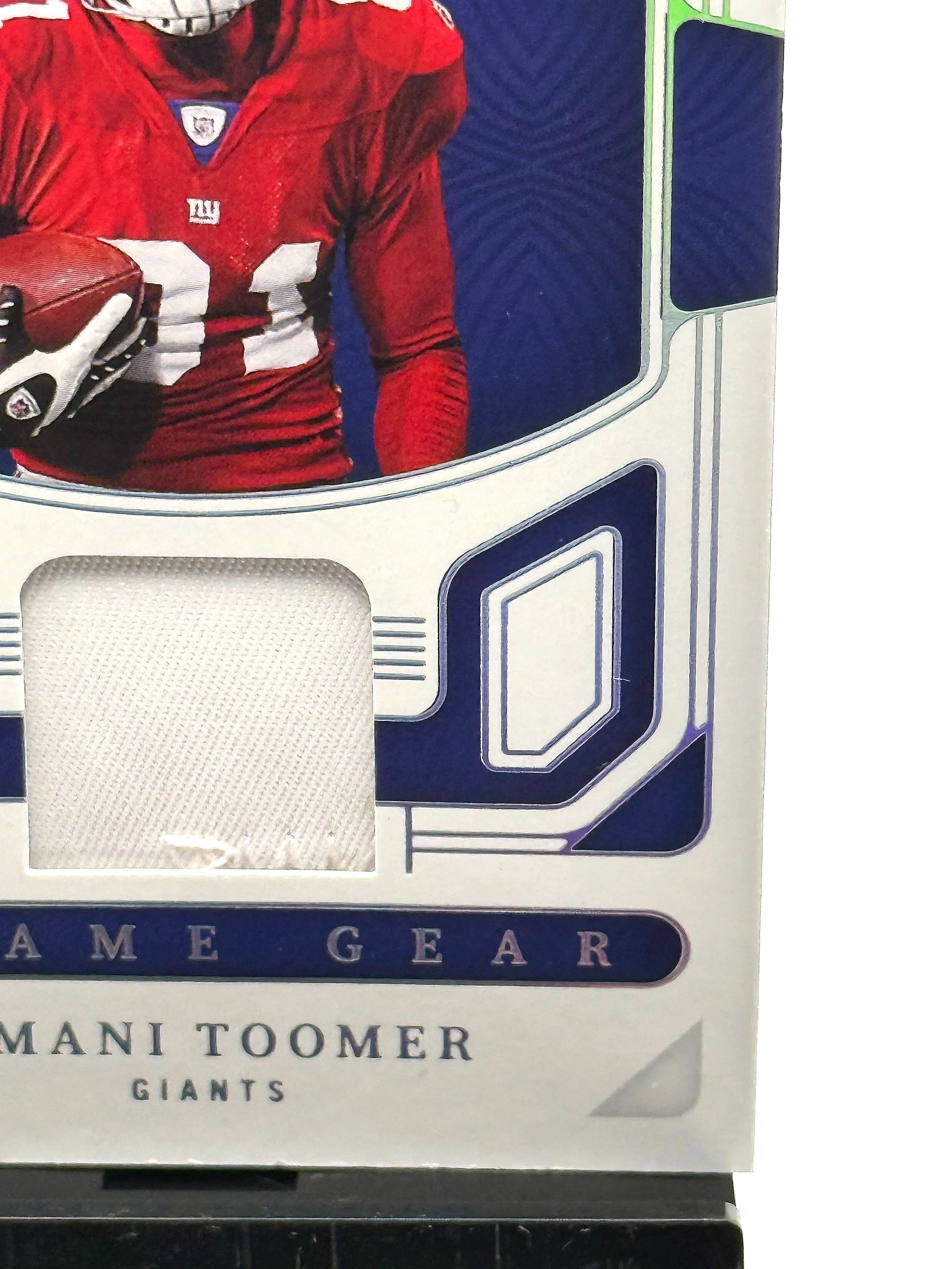 2022 National Treasures Amani Toomer Game Gear Game-Worn Patch /25 #GTE-ATO football card bottom right corner