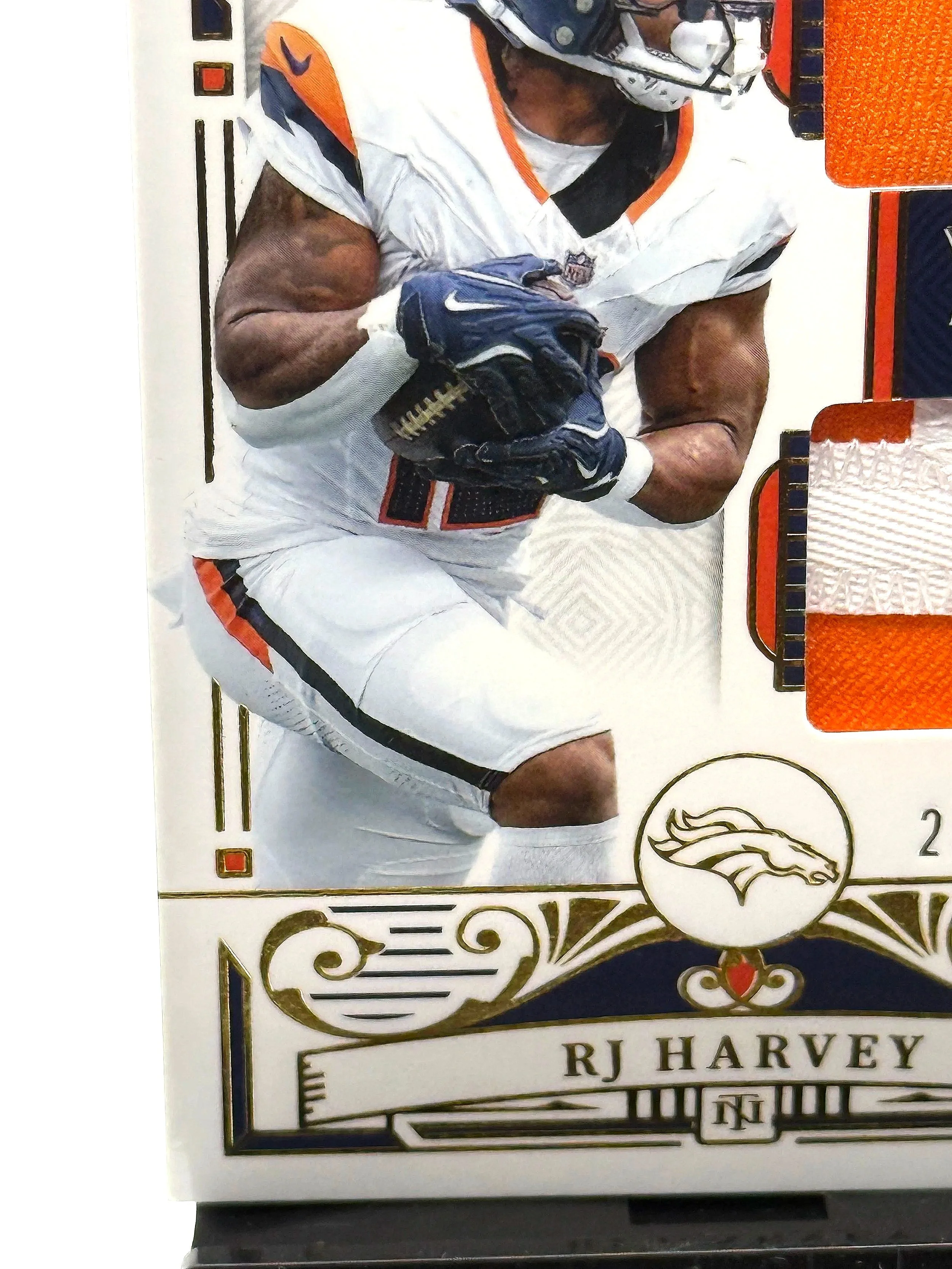 2025 National Treasures RJ Harvey Dual Patch Rookie /35 NT RP #13 Broncos football card bottom left corner