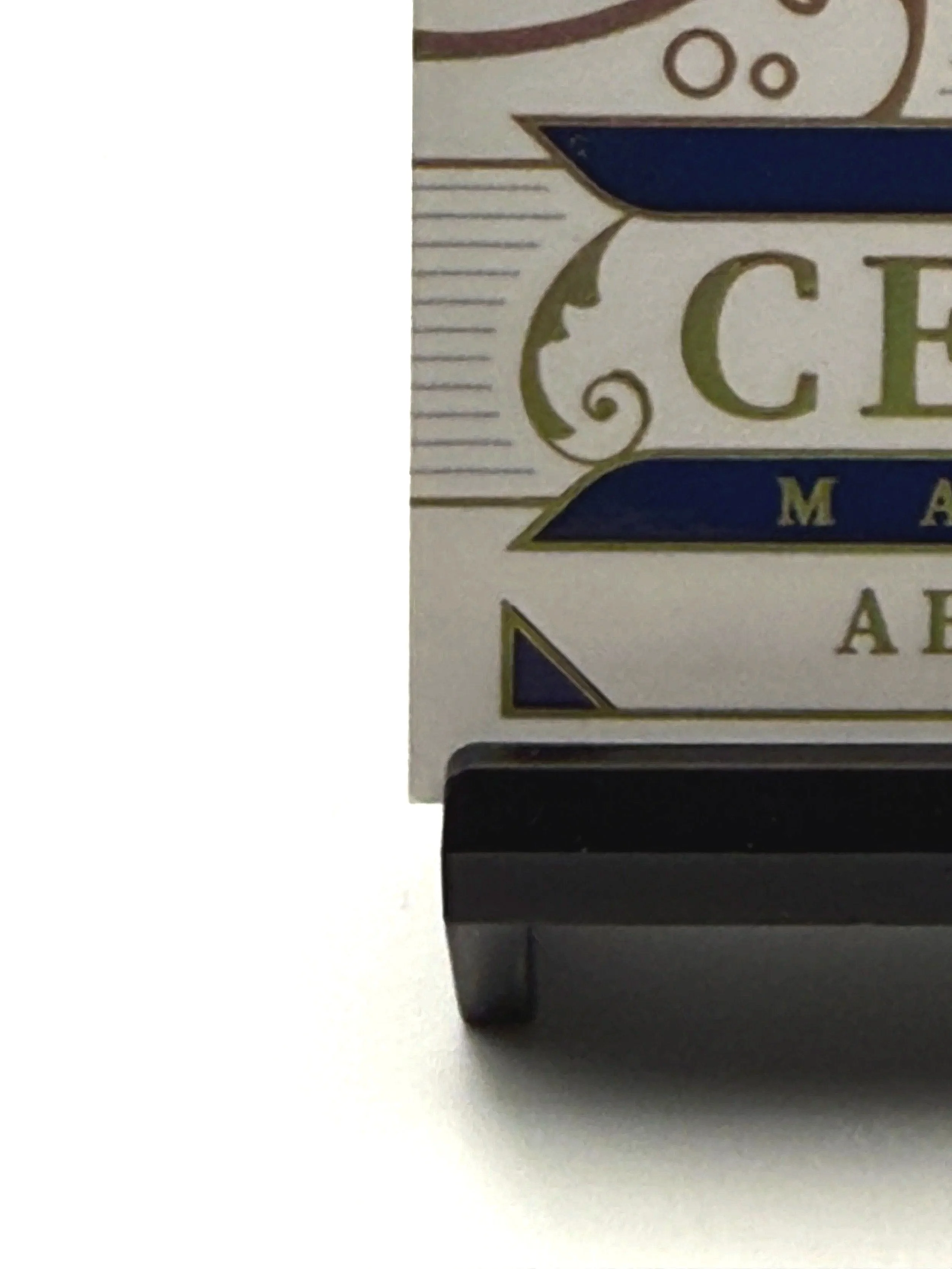 Bottom left corner close-up of 2025 National Treasures Abdul Carter Century Materials /10 rookie patch card showing edge and corner condition