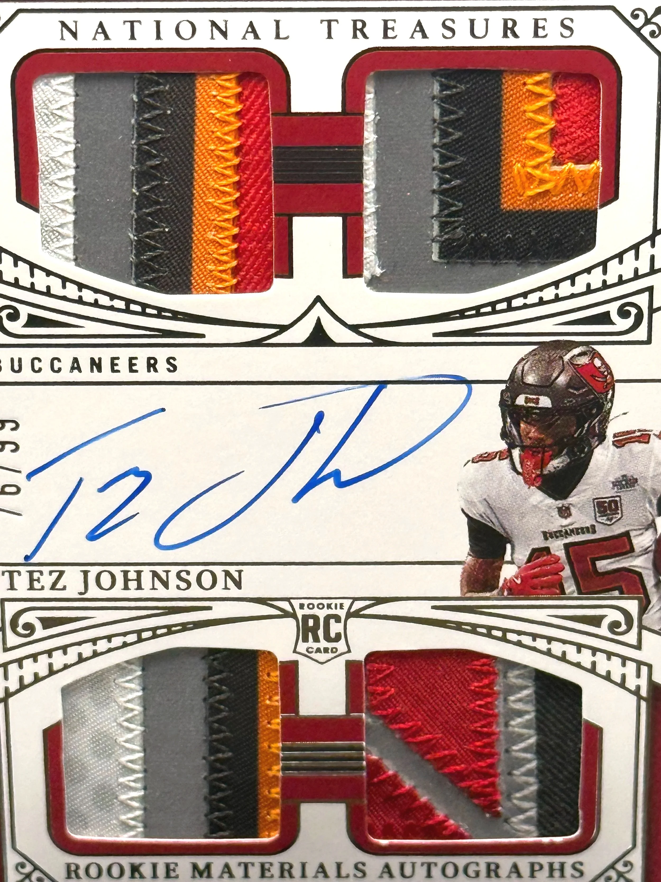 2025 Panini National Treasures – Tez Johnson Rookie Materials Auto Quad Patch #RMAQ-TJN football card front detail