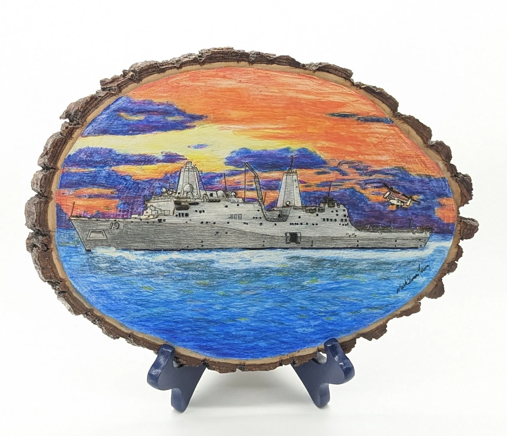 🔴 Sold:
Commission USS Mesa Verde LPD-19 Sailing Red at Night Sailors Delight Pyrography by Art Illusions by Young, Folsom, Louisiana. This dramatic woodburn on a natural wood slice captures the San Antonio-class amphibious transport dock USS Mesa V
