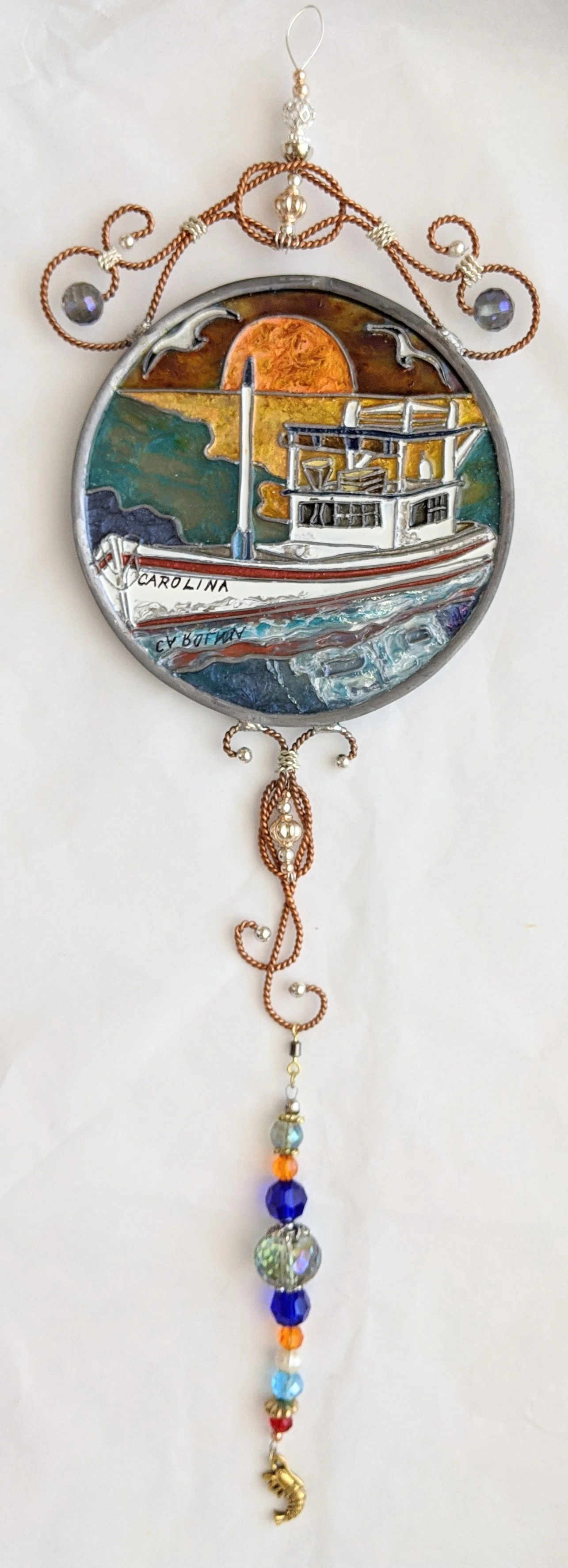 🔴 Sold: 
Cajun Shrimp Boat Illusion Glass by Art Illusions by Young. This classic circular piece portrays a traditional Cajun shrimp boat on Louisiana waters, complete with nets and warm coastal lighting. Hand-painted details celebrate the working h