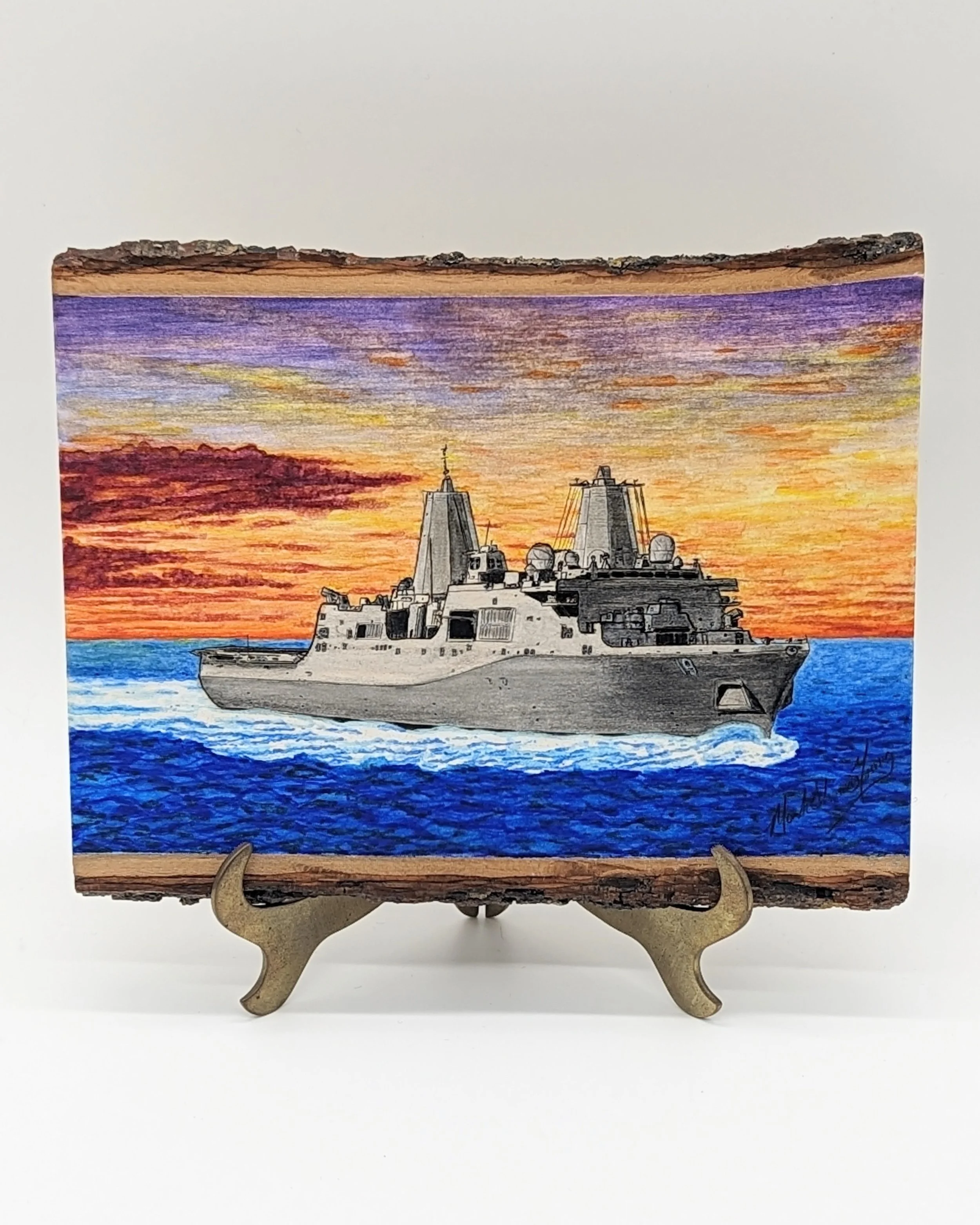 🔴 Sold:
Commission USS Mesa Verde LPD-19 Pyrography by Art Illusions by Young, Folsom, Louisiana. This striking woodburn on a natural wood slice captures the San Antonio-class amphibious transport dock USS Mesa Verde (LPD-19) sailing at twilight, he
