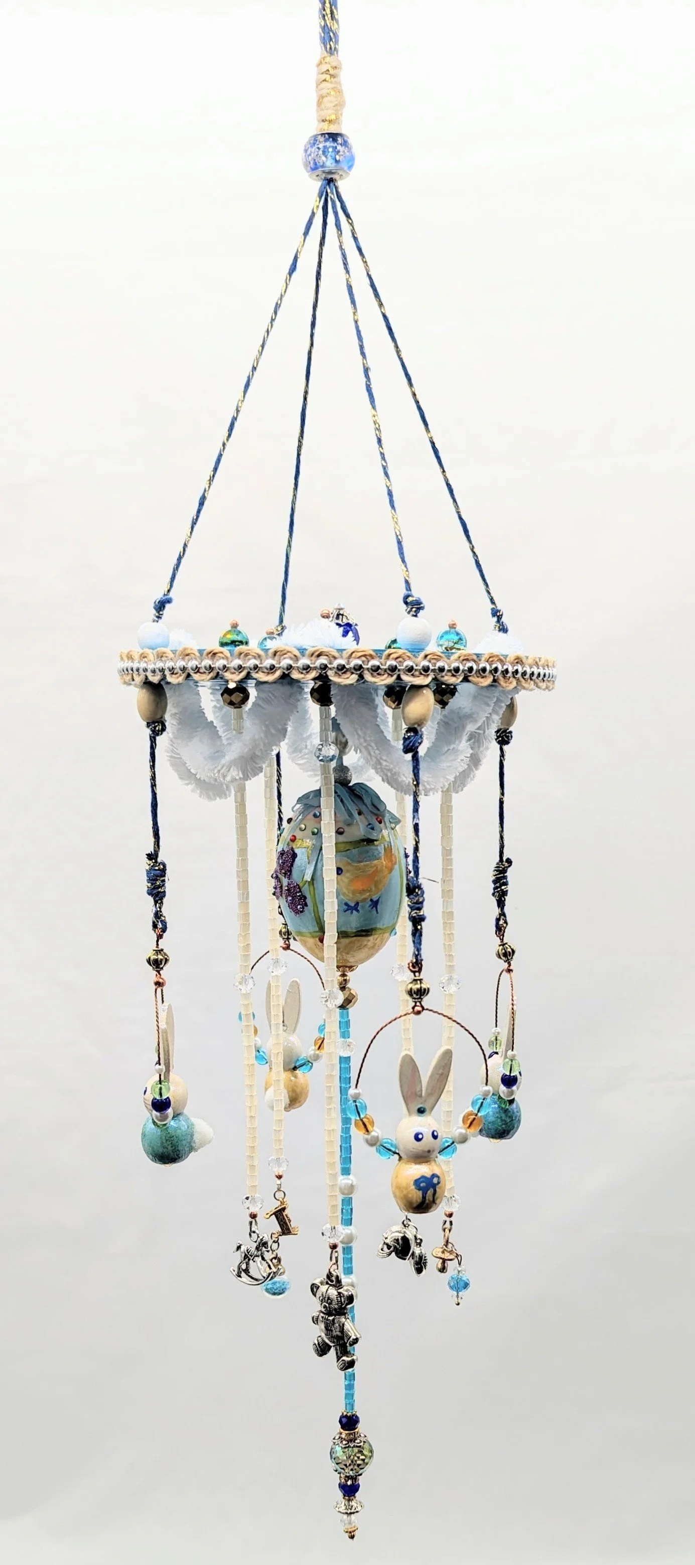 🔴  Sold  :
Baby Mobile – Cherished Nursery Keepsake by Art Illusions by Young from Folsom, Louisiana. This luminous custom mobile was created as a heartfelt keepsake for a soon-to-arrive baby boy. A six-inch painted and beaded blue wooden disc serve