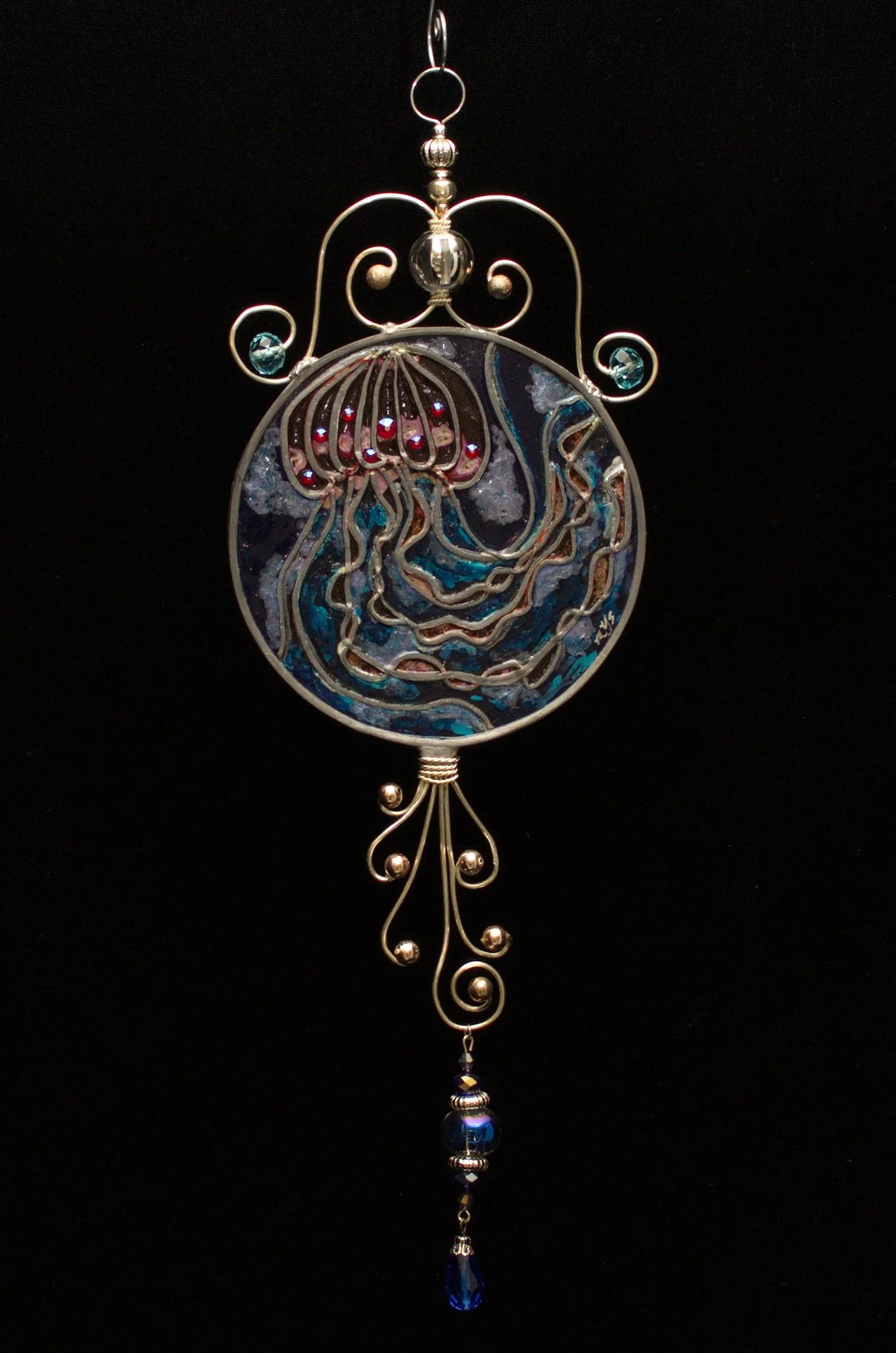 Jellyfish by Art Illusions by Young against a dark background. A graceful jellyfish drifts silently through turquoise waters in this hand-painted and leaded Illusion Glass panel. The dark backdrop dramatically highlights the coral-colored bell and fl