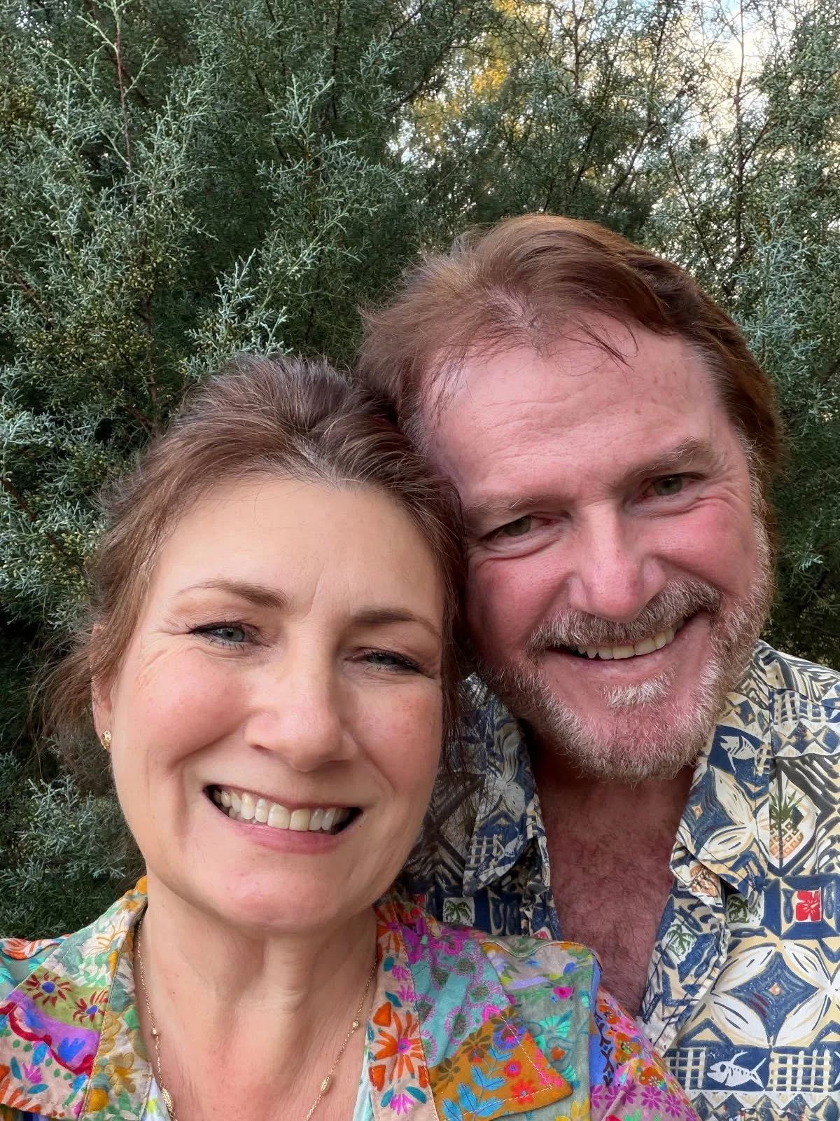 Mark Thomas Young and Sandra Young, artists and owners of Art Illusions by Young in Folsom, Louisiana. Portrait of the husband-and-wife team behind the handcrafted dioramas, Illusion Glass, and functional art pieces.
