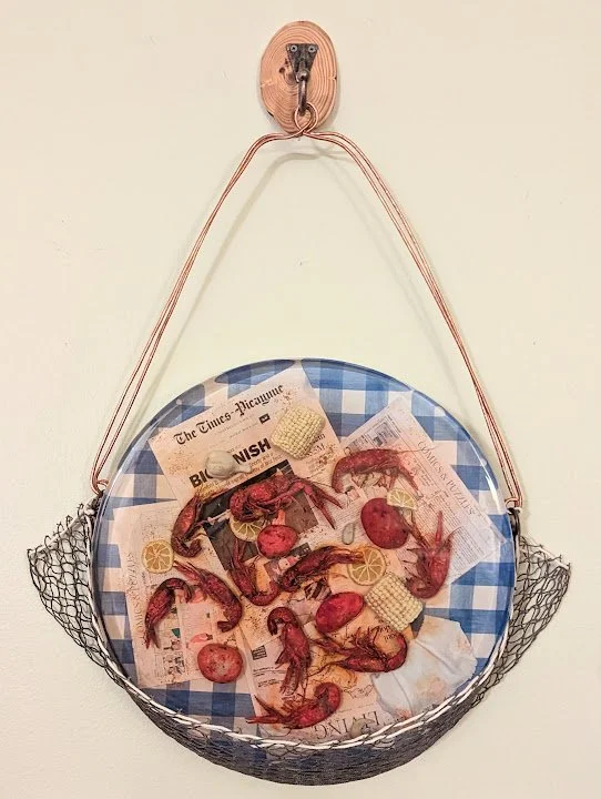 🟢 Available : 
Handcrafted crawfish boil wall art by Art Illusions by Young. A lively Louisiana crawfish boil scene with real taxidermy crawfish, polymer clay corn, potatoes, lemons, and newspaper texture is enclosed in clear epoxy and mounted with 