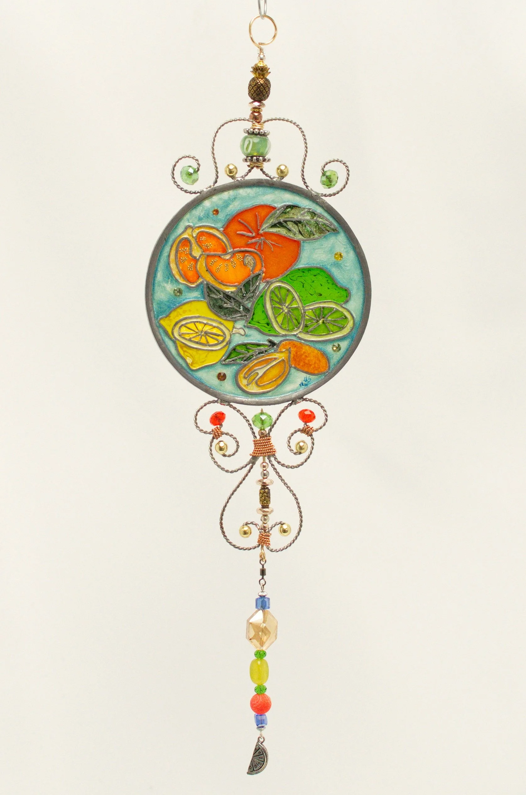 Citrus Medley by Art Illusions by Young. A vibrant celebration of fresh summer citrus bursts with life in this hand-painted and leaded Illusion Glass panel. Bright lemons, limes, mandarins, and kumquats in glowing shades of yellow, lime green, and vi