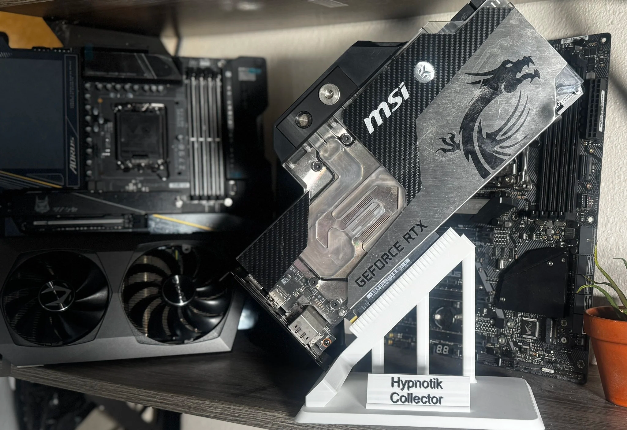 Black 3D printed GPU display stand for retired graphics cards — Hypnotik3D