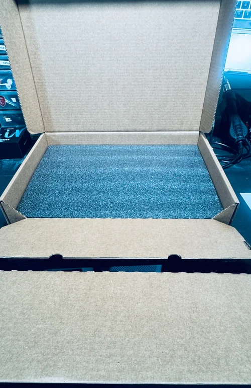 Device seated in the foam or anti static cradle
