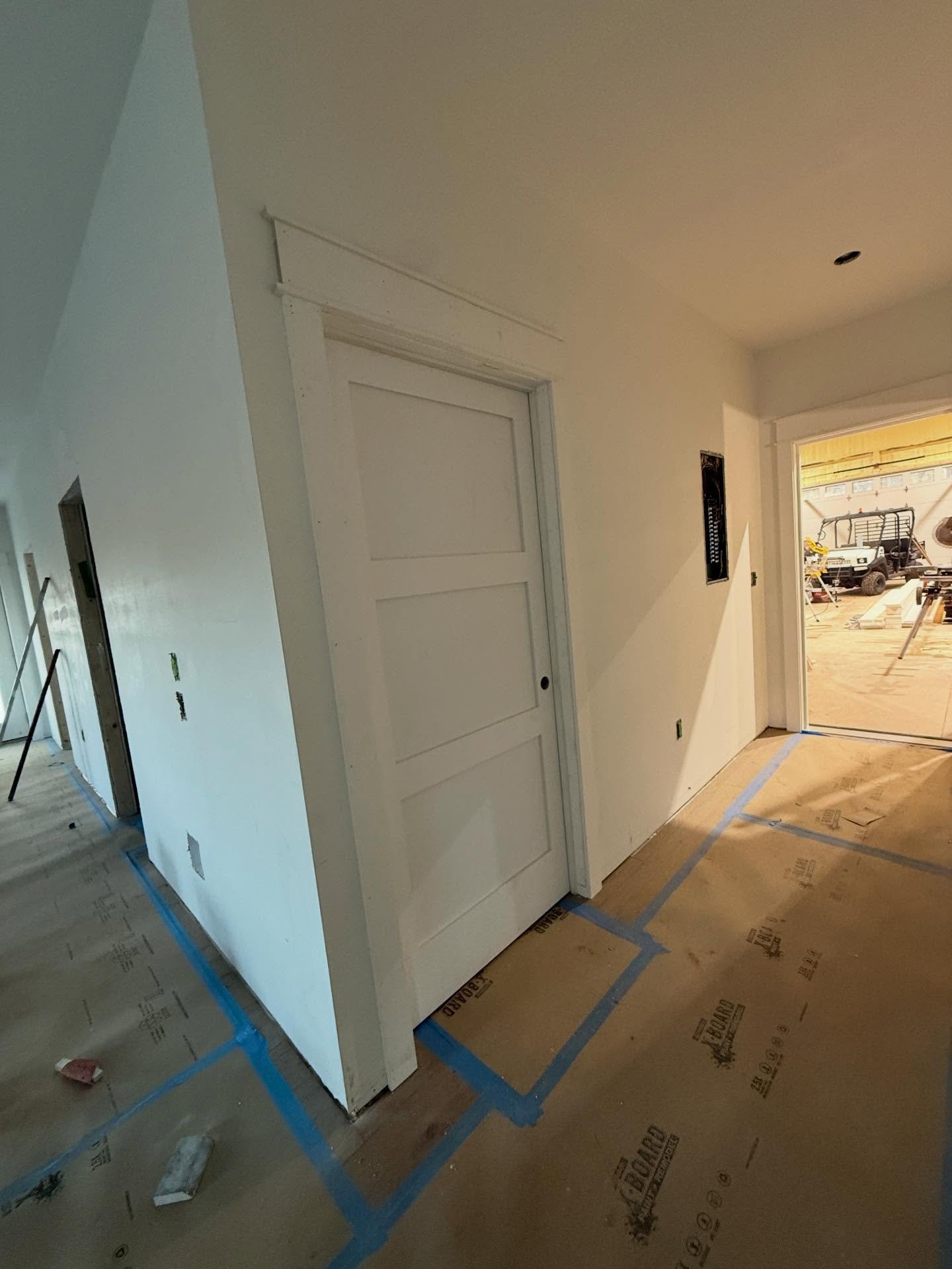 Doors installed and trimmed out in a simple craftsman style