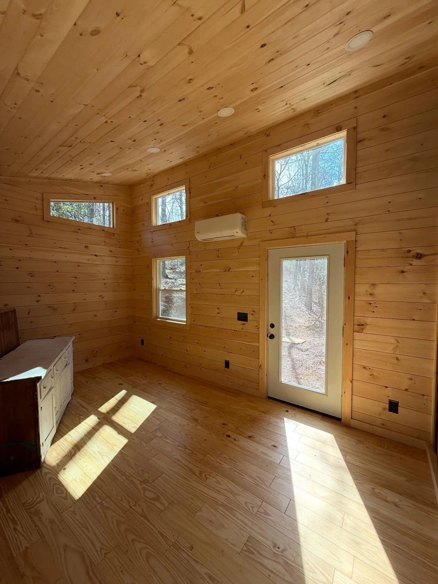 Inside shots of this addition, all the pine!