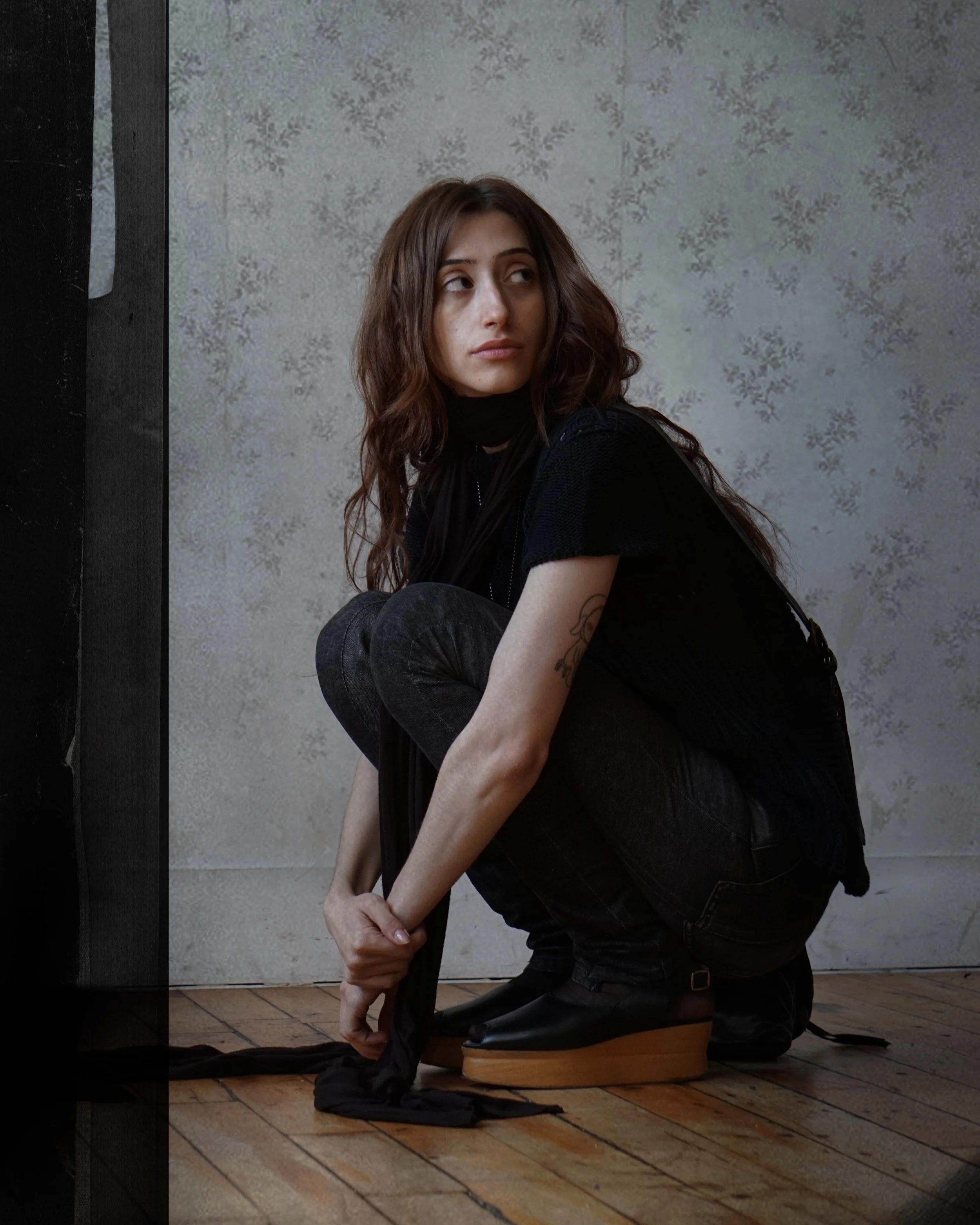 Editorial picture styled with items from Issey miyake, yohji yamamoto, and archive vivienne westwood
