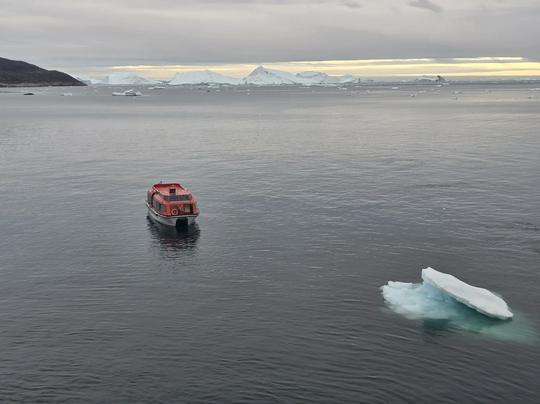 2026-8-31 - Ilulissat - Roald Amundsen tender in ice floes 1.jpg