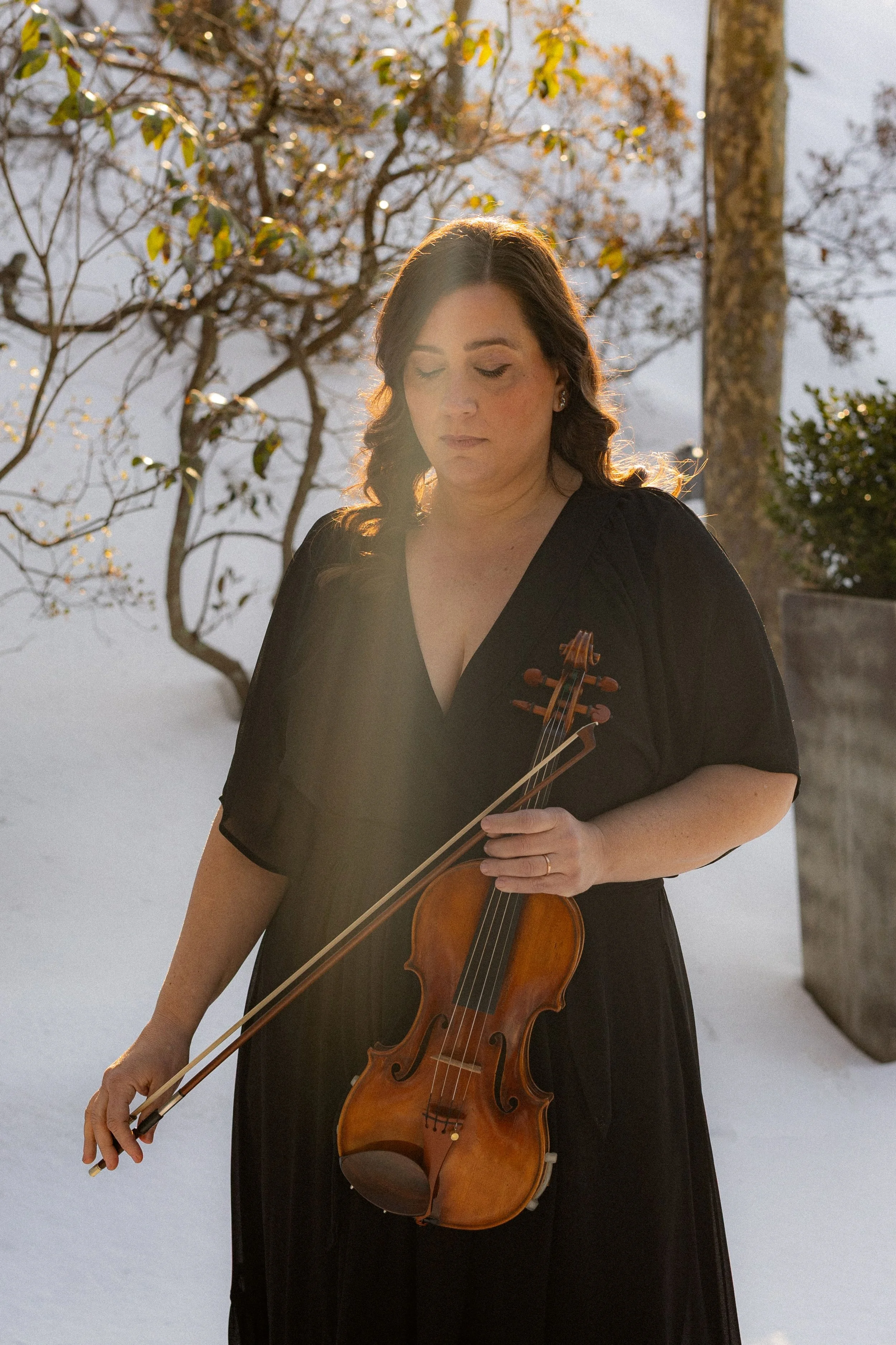 Live violin music during outdoor wedding ceremony in the Hamptons