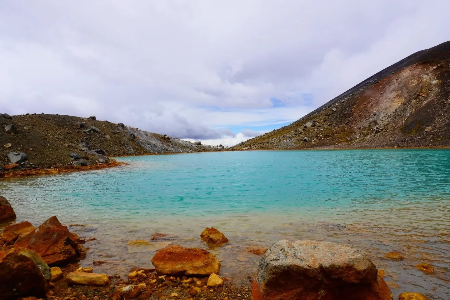 These experiences defy description. Suffice to say no profound words could convey what living these moments is like.

1. Storm breaking over blue lakes on the tongariro crossing.

2. Working on my macro, some sort of chamomile/daisy?

3. A bend in th