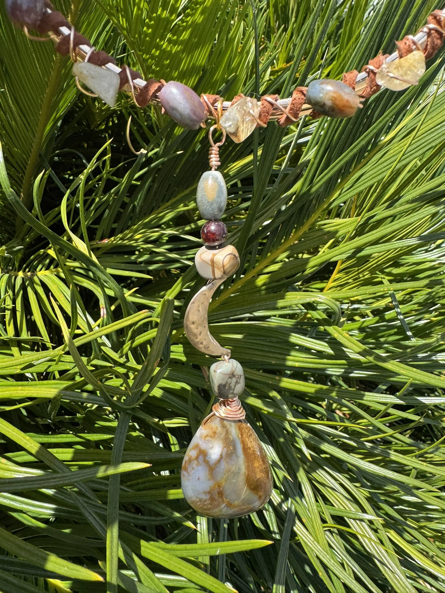 Gold plated Torc necklace with stones and charm