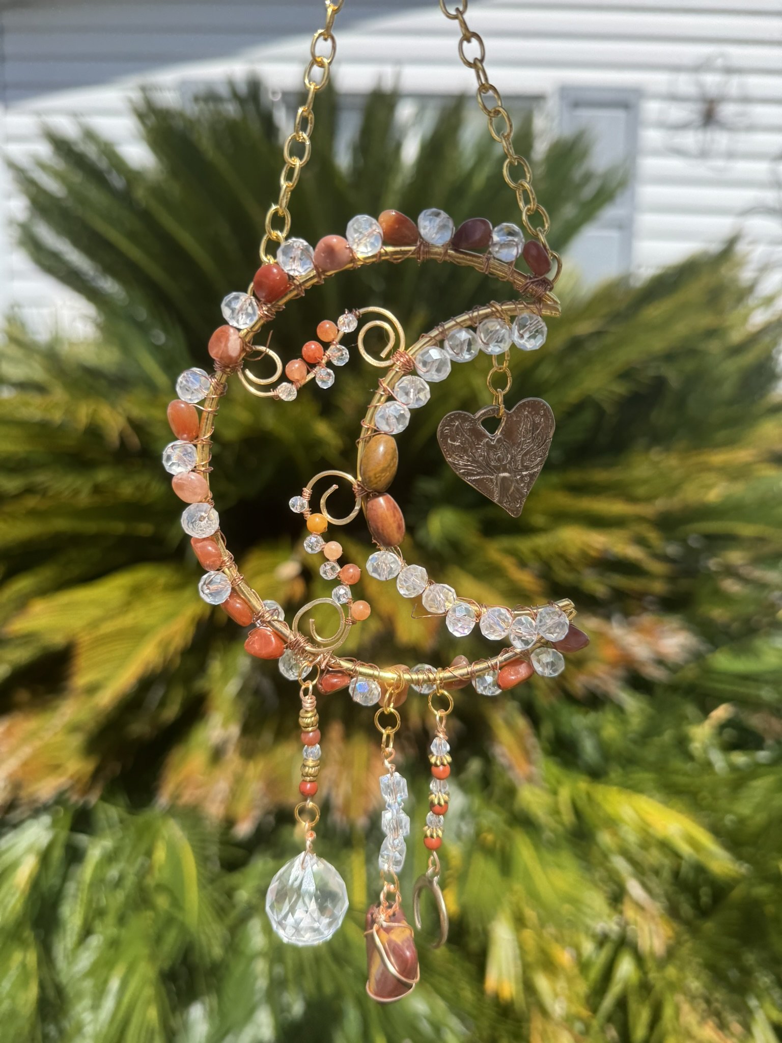 Half moon sun catcher with carnelian