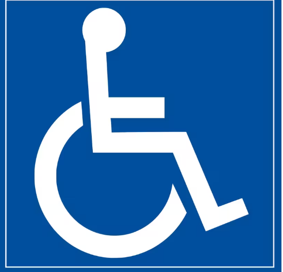 Symbole de handicap en blanc sur fond bleu, représentant une personne en fauteuil roulant.