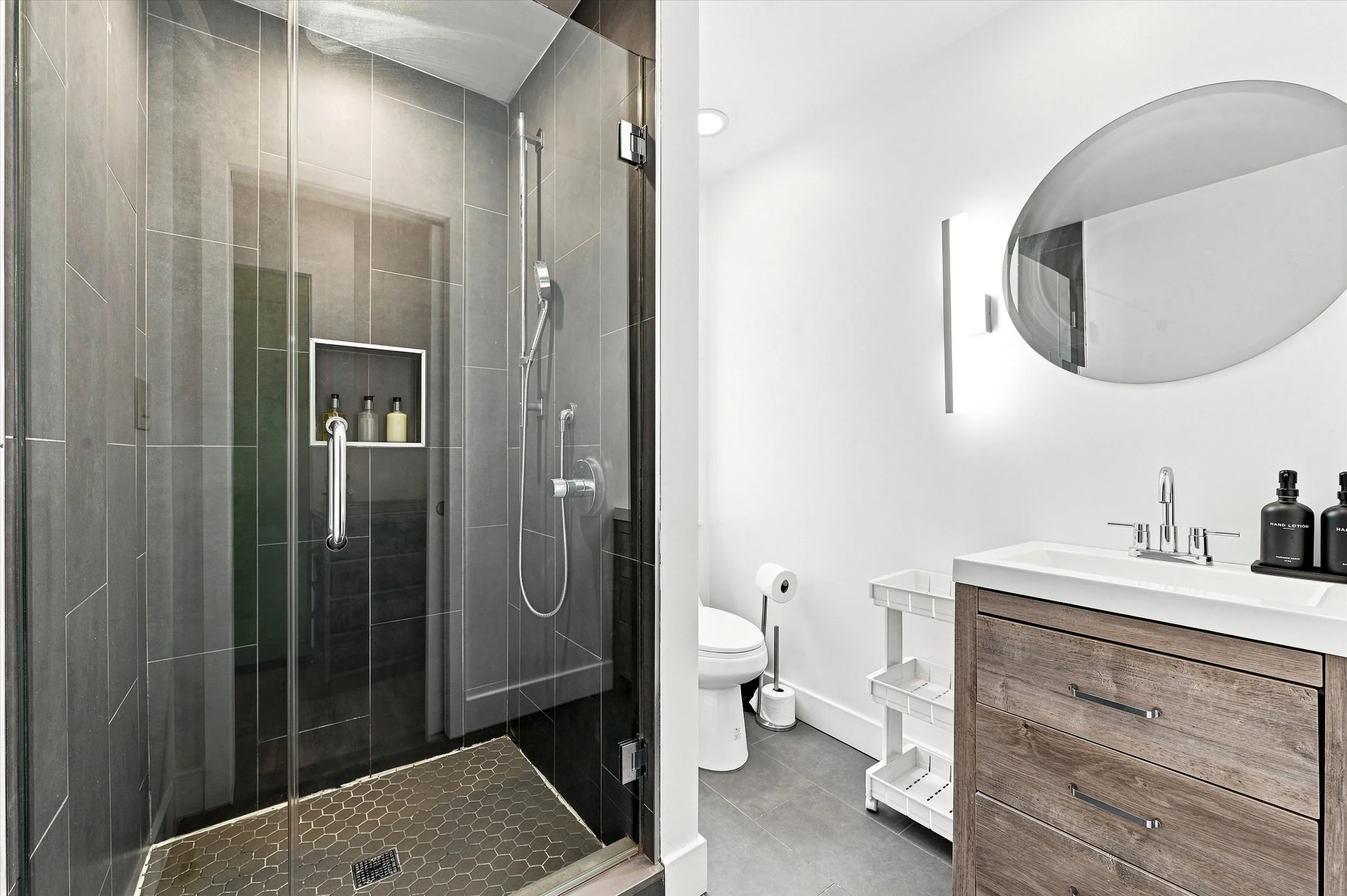 Hallway Bathroom with shower and storage.jpg